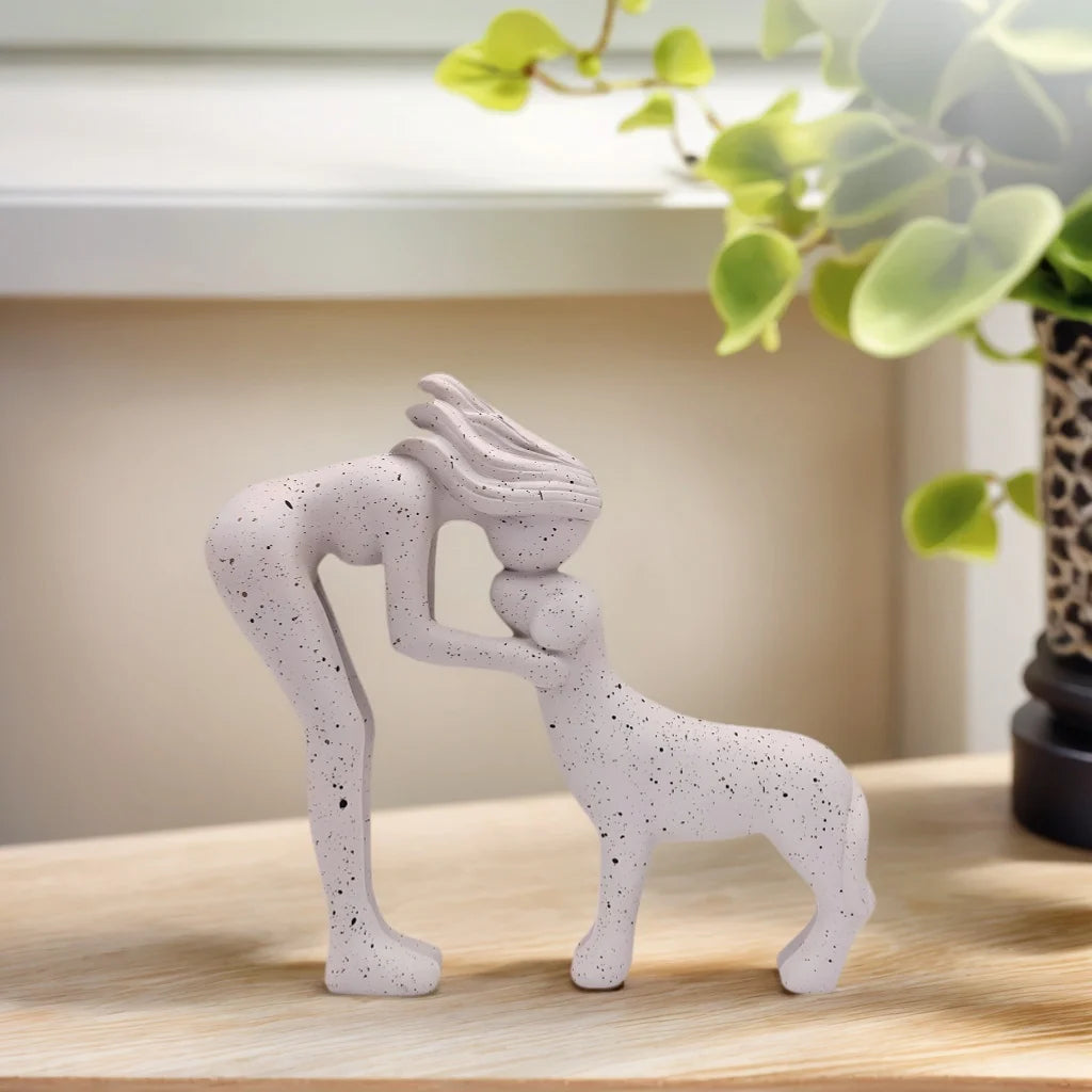 Girl Hugging Dog Statue