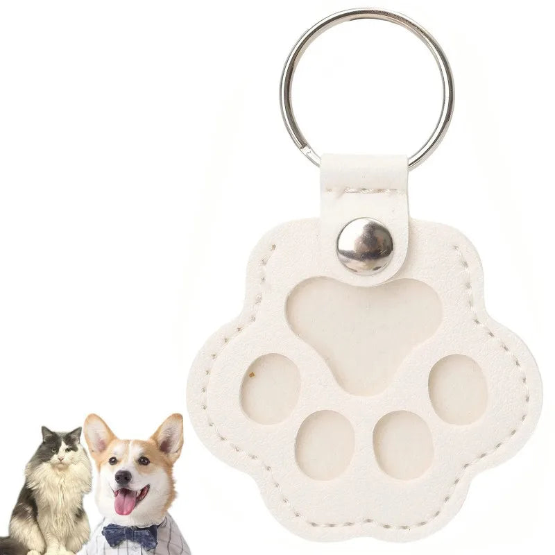 White paw pouch keyring