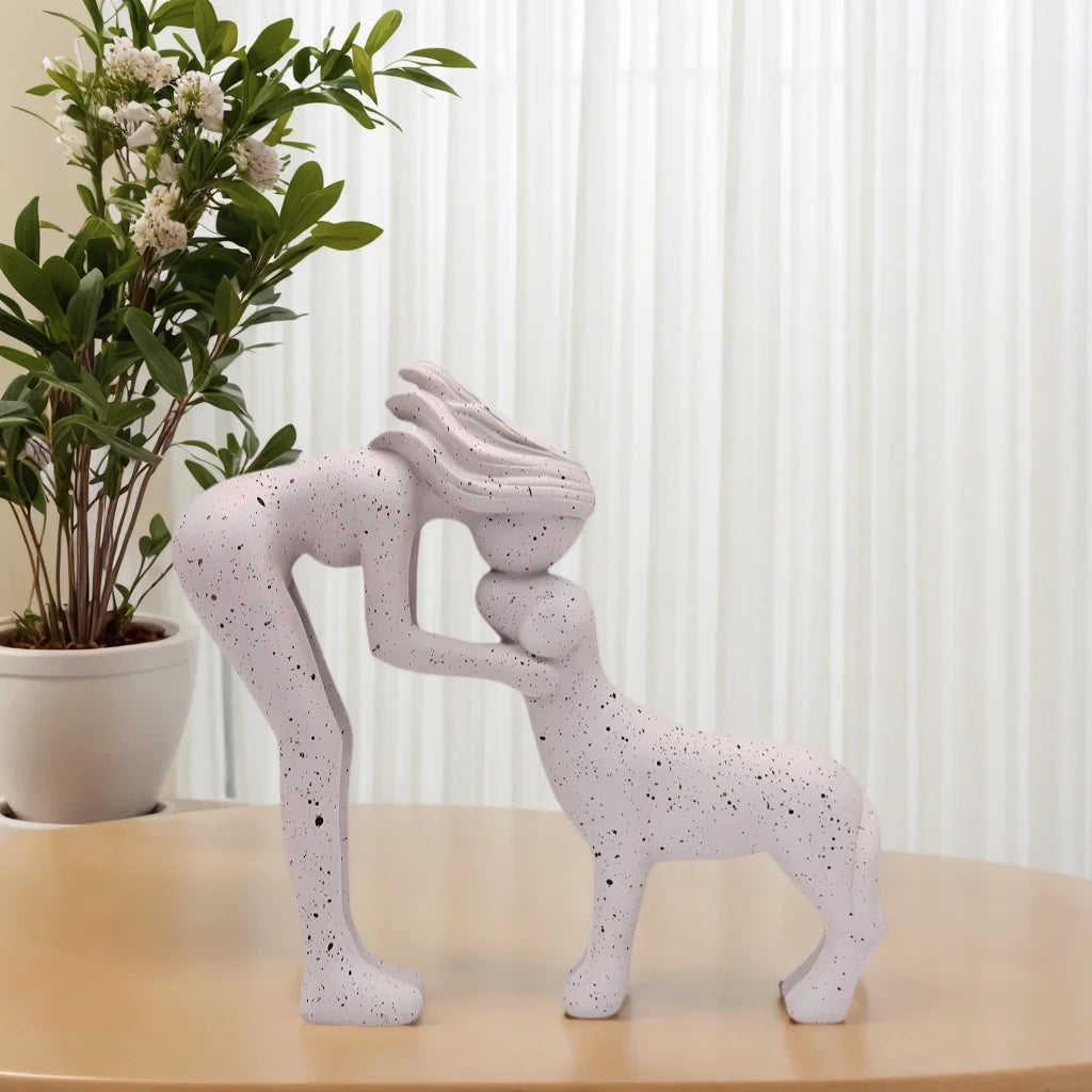 Girl Hugging Dog Statue