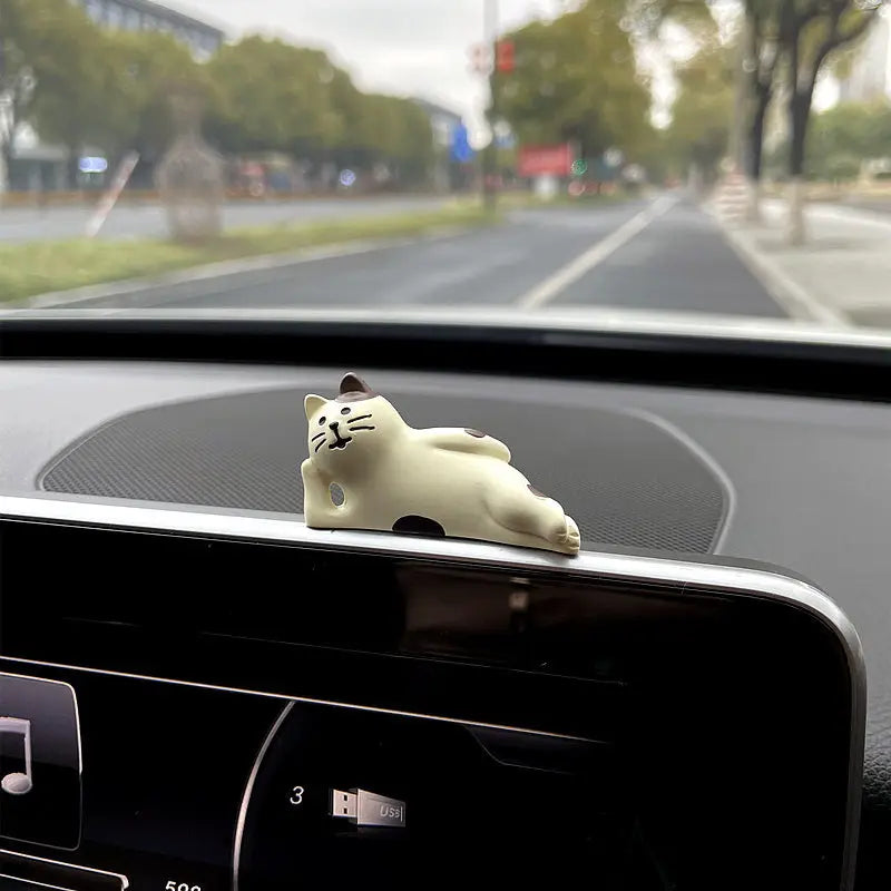 Sleepy Kitten Dashboard Figurine