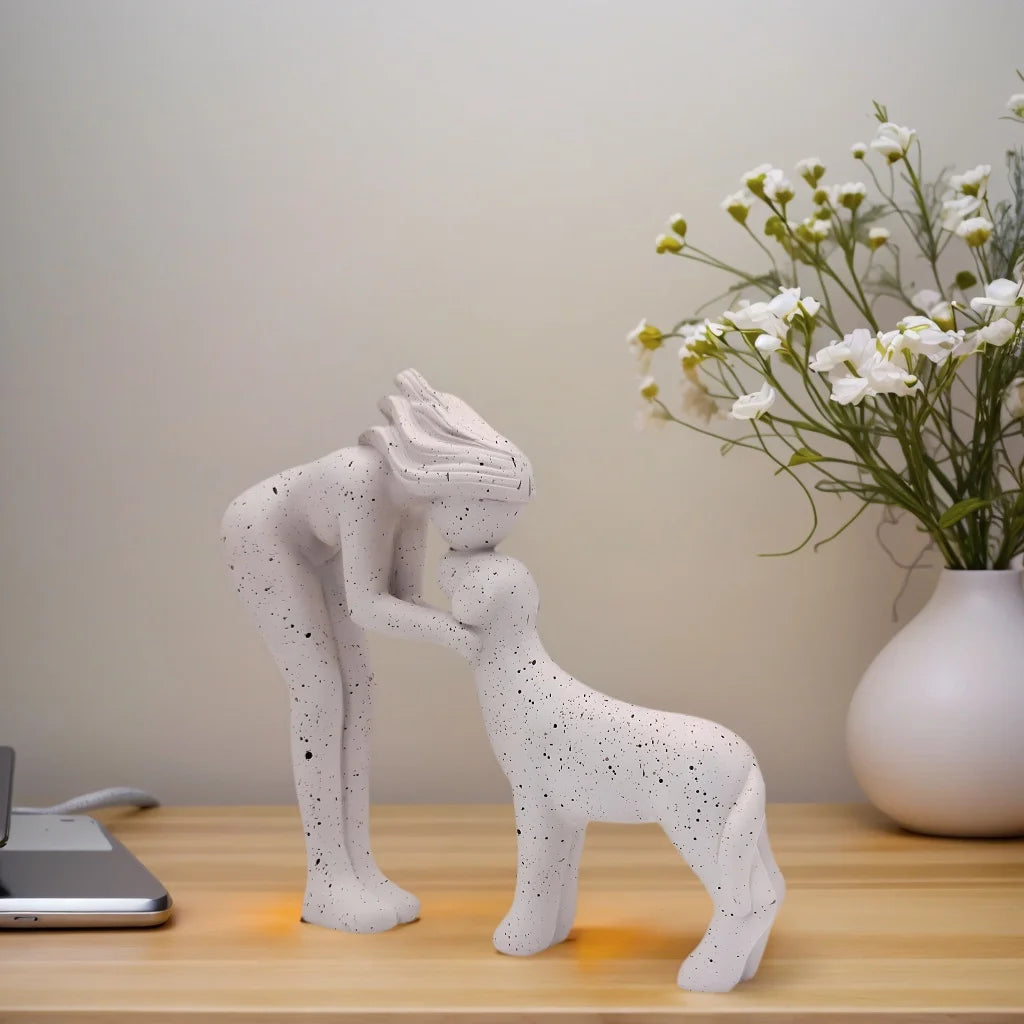Girl Hugging Dog Statue